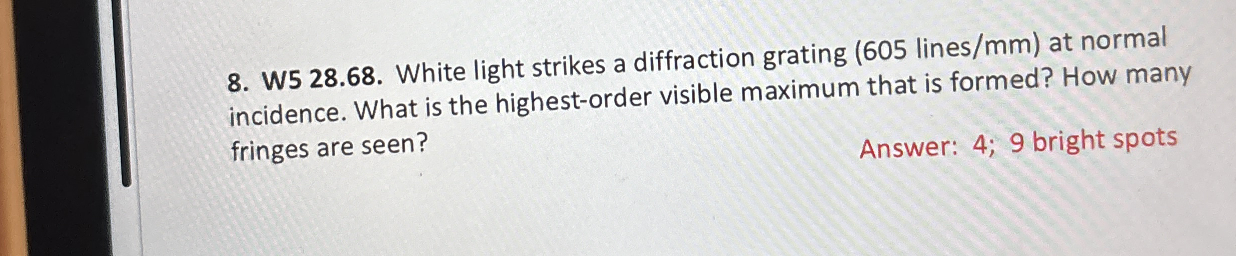 W 5 2 8 . 6 8 . White light strikes a diffraction