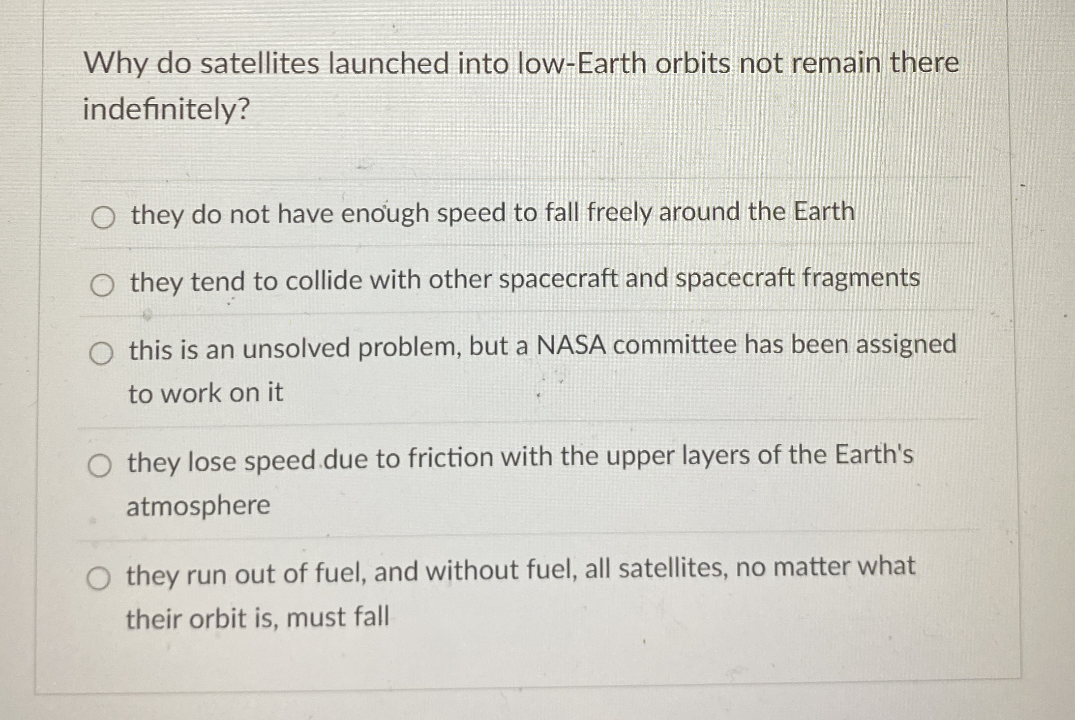 Why do satellites launched into low - Earth