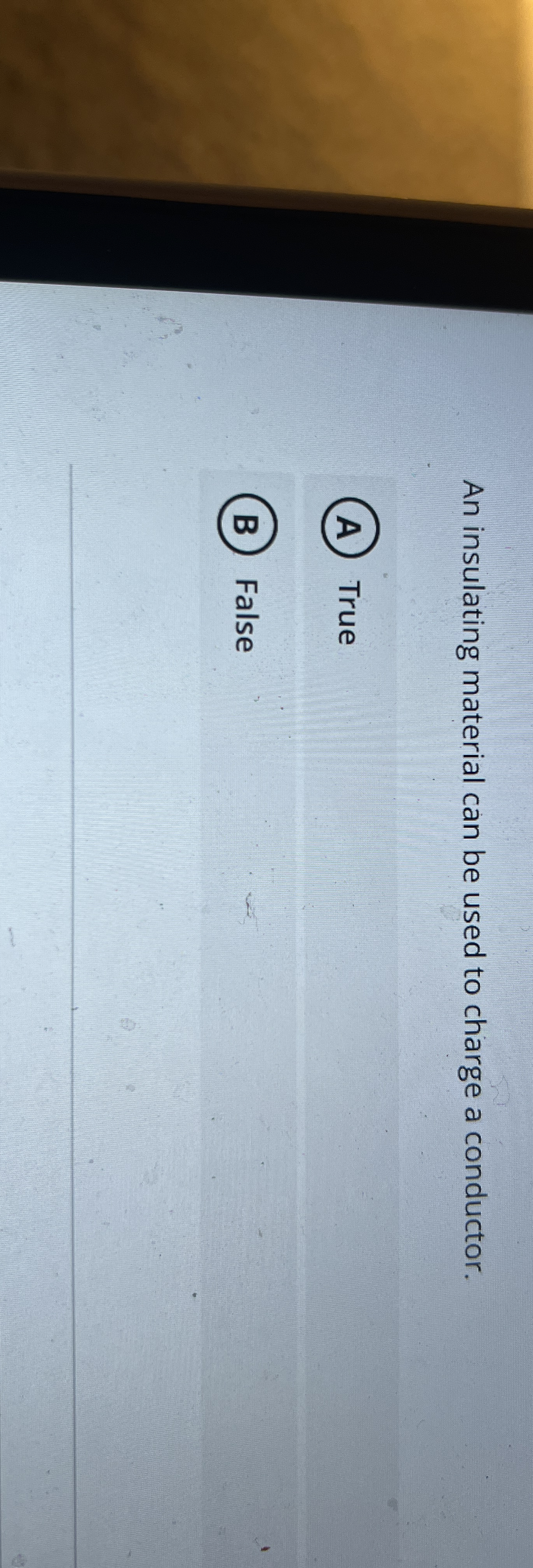 An insulating material can be used to charge a