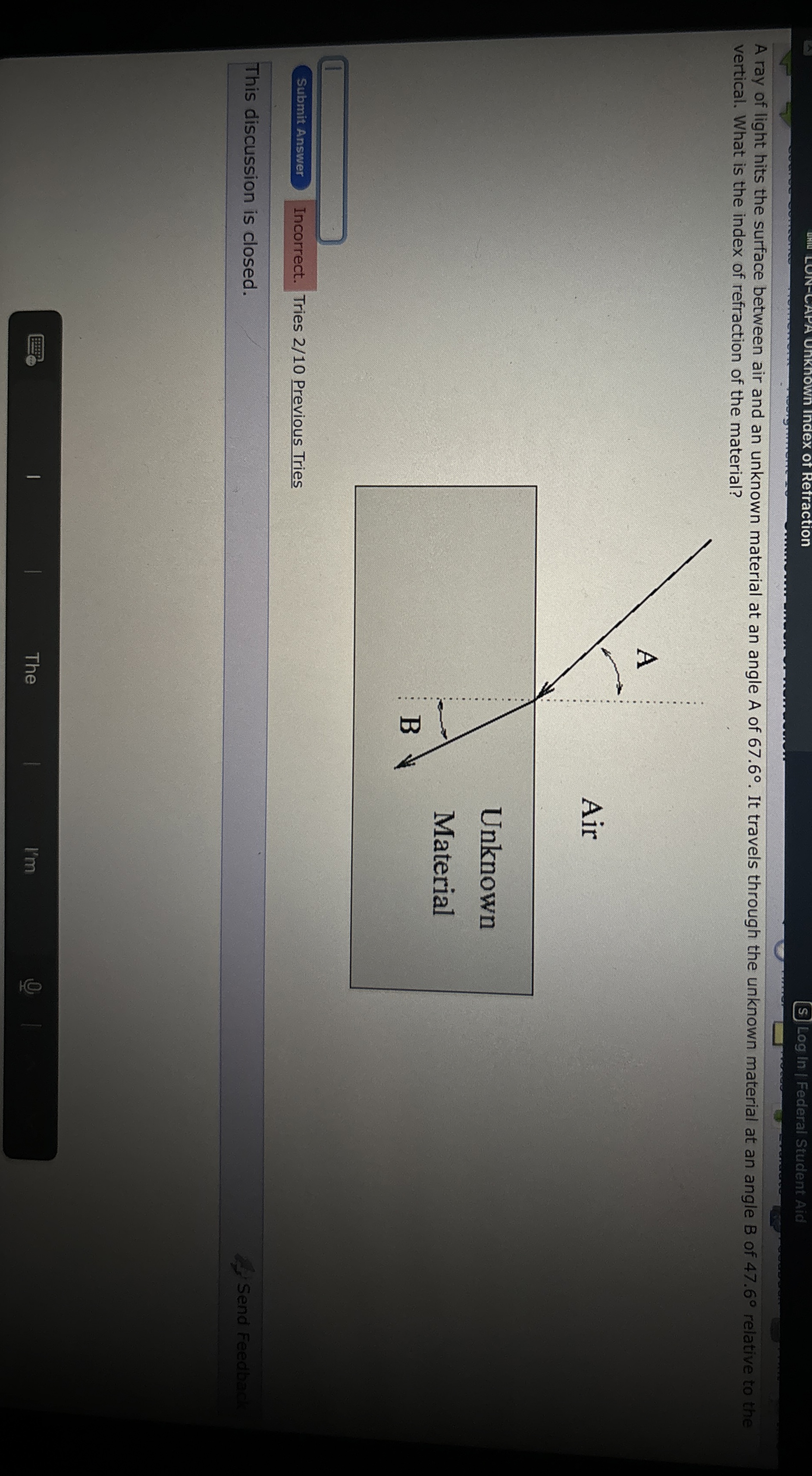 A ray of light hits the surface between air and