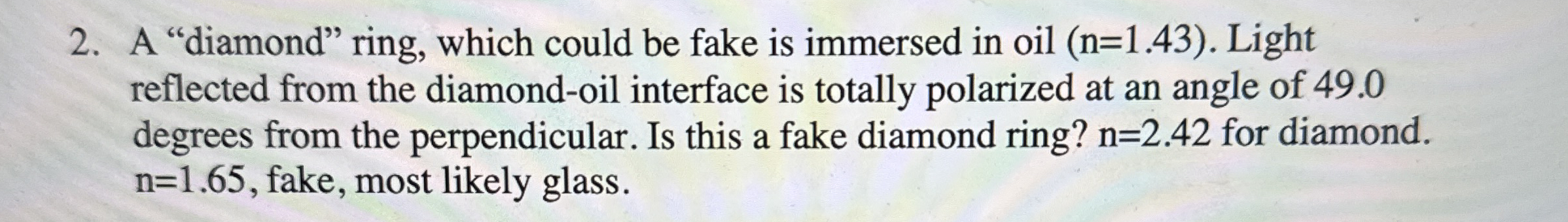 A "diamond" ring, which could be fake is immersed