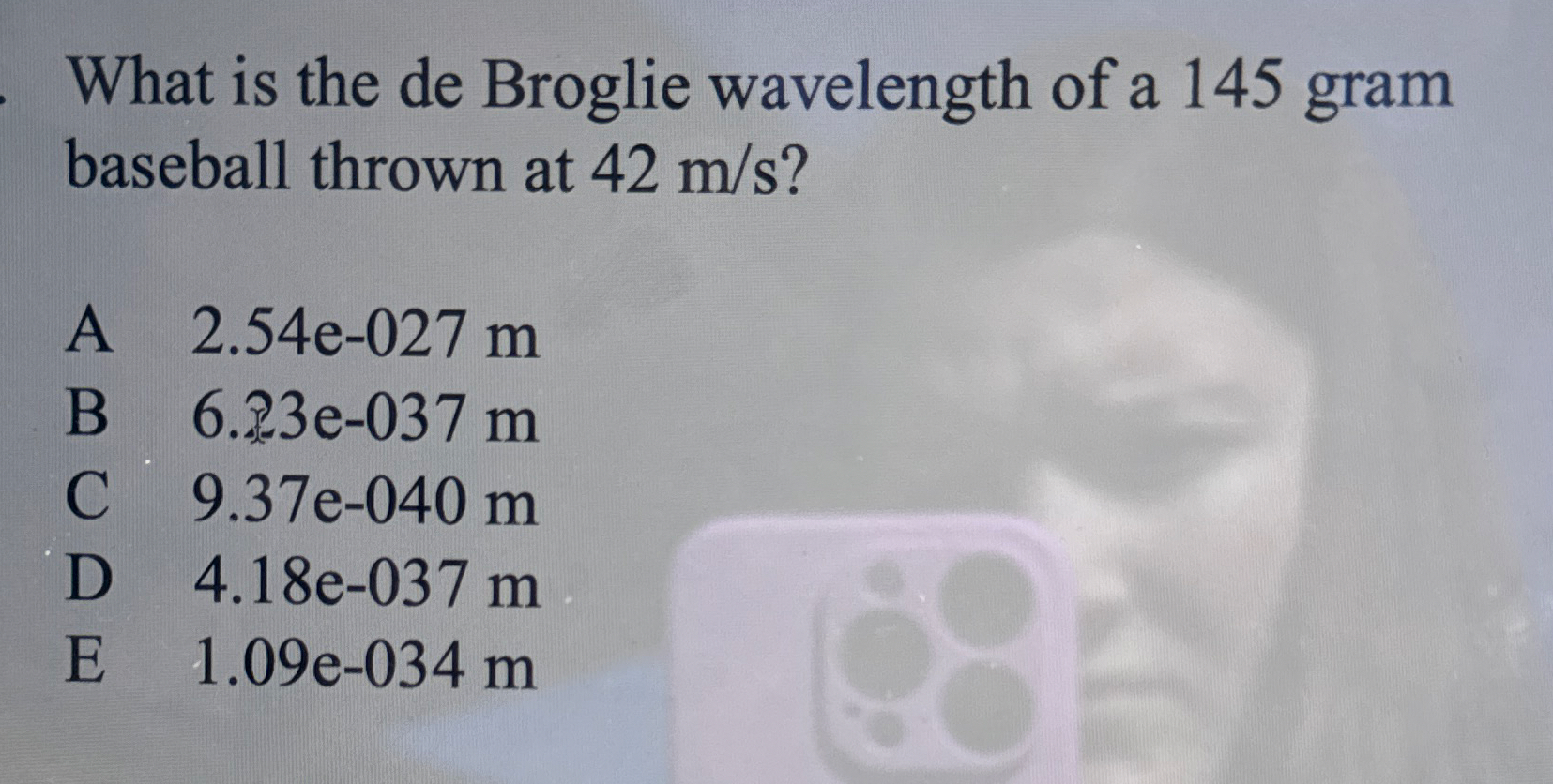 What is the de Broglie wavelength of a 1 4 5 gram