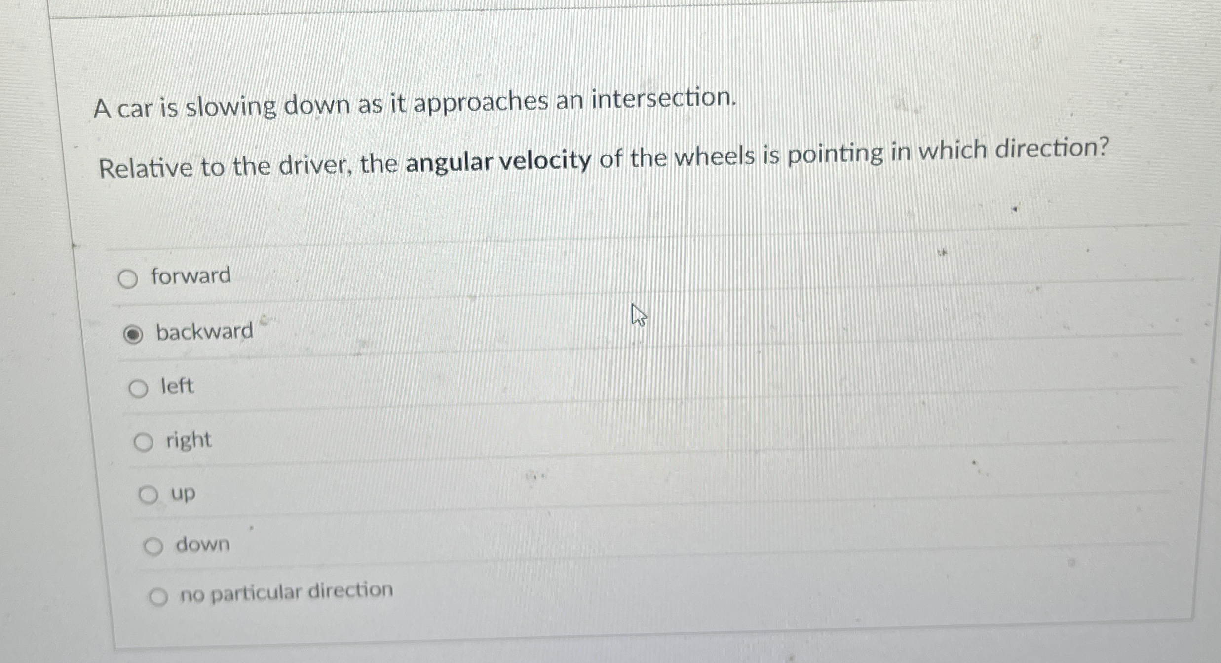 A car is slowing down as it approaches an