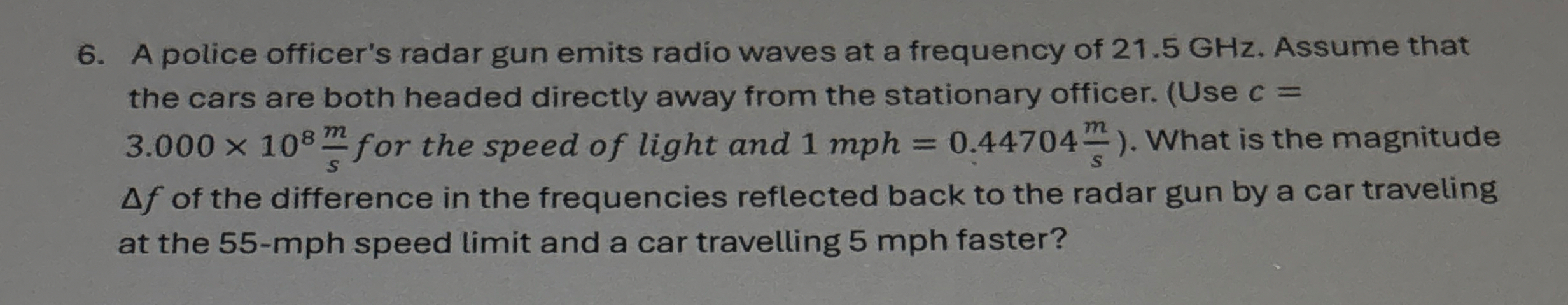 A police officer's radar gun emits radio waves at