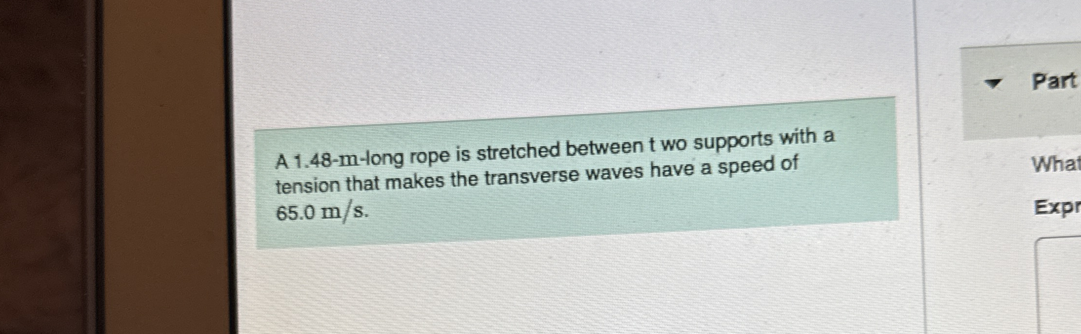 A 1 . 4 8 - m - long rope is stretched between t
