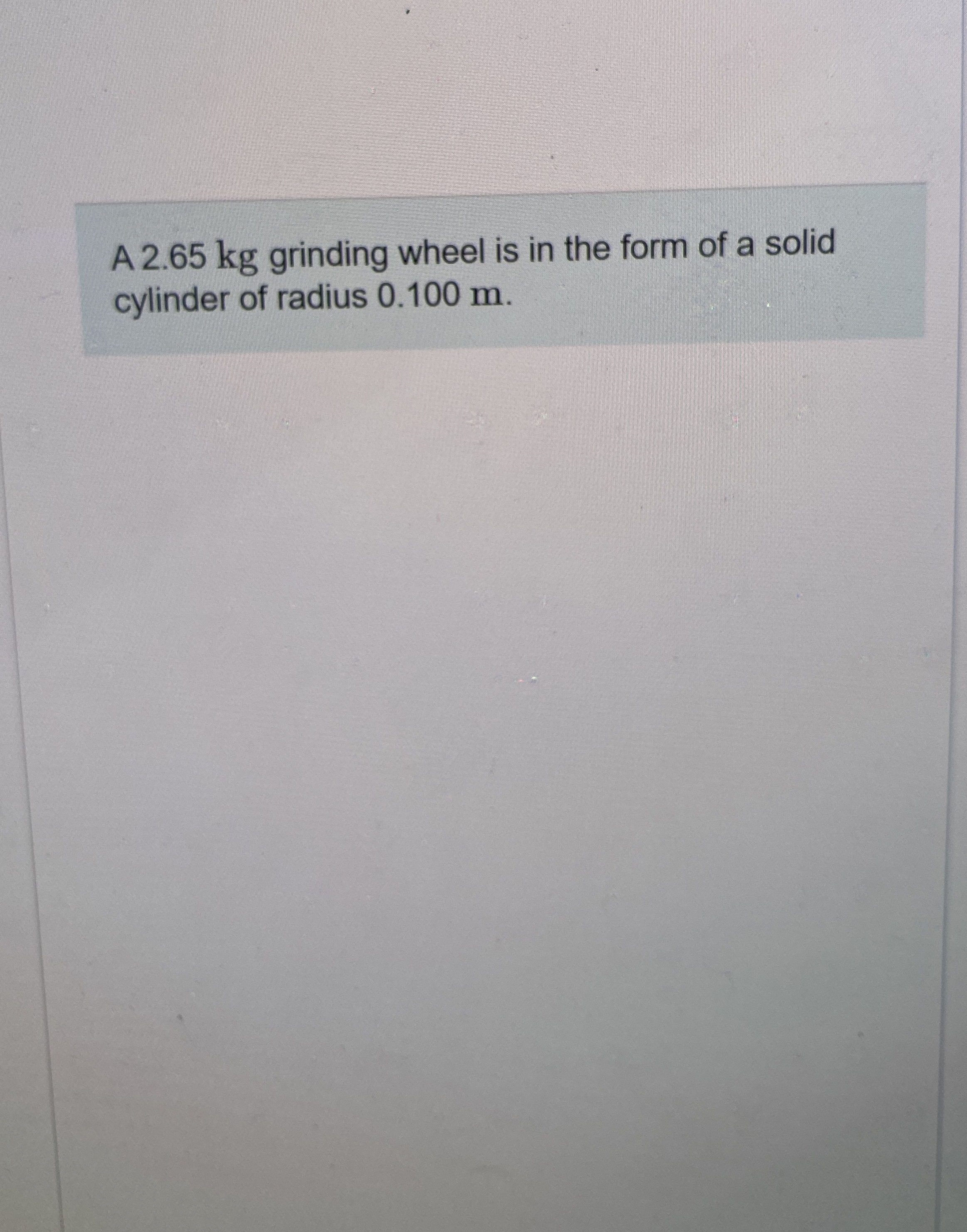 A 2 . 6 5 kg grinding wheel is in the form of a
