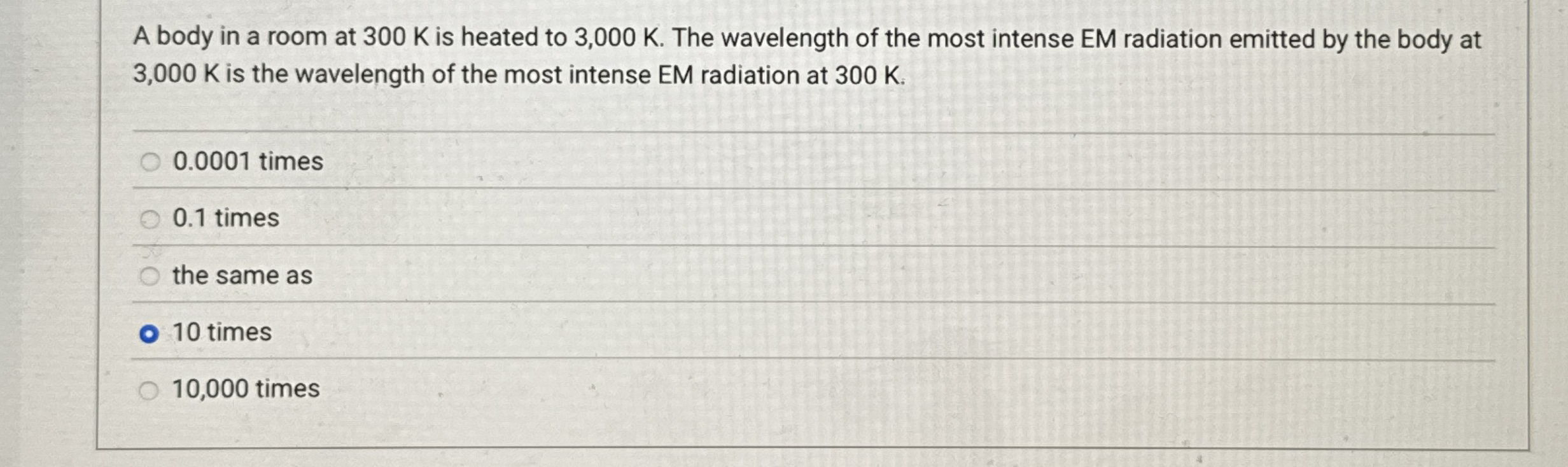 A body in a room at 3 0 0 K is heated to 3 , 0 0