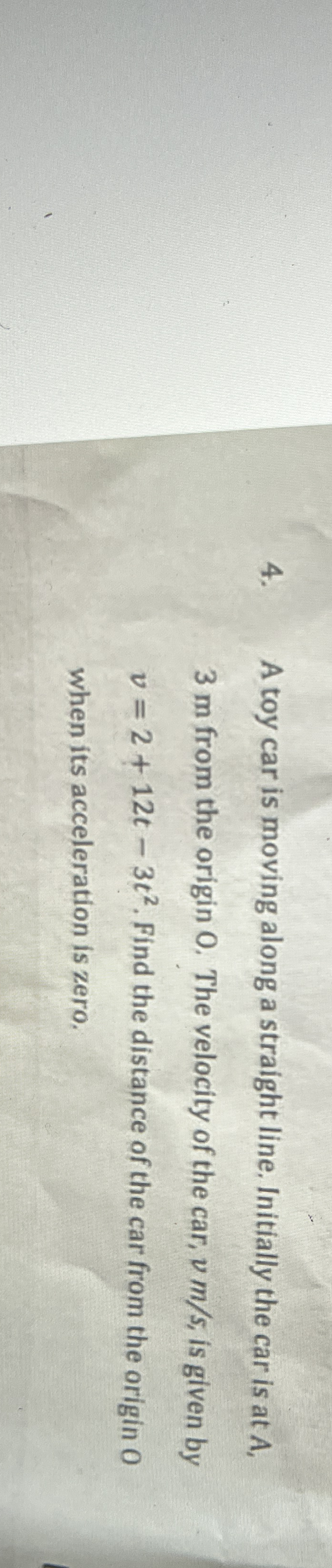 A toy car is moving along a straight line.