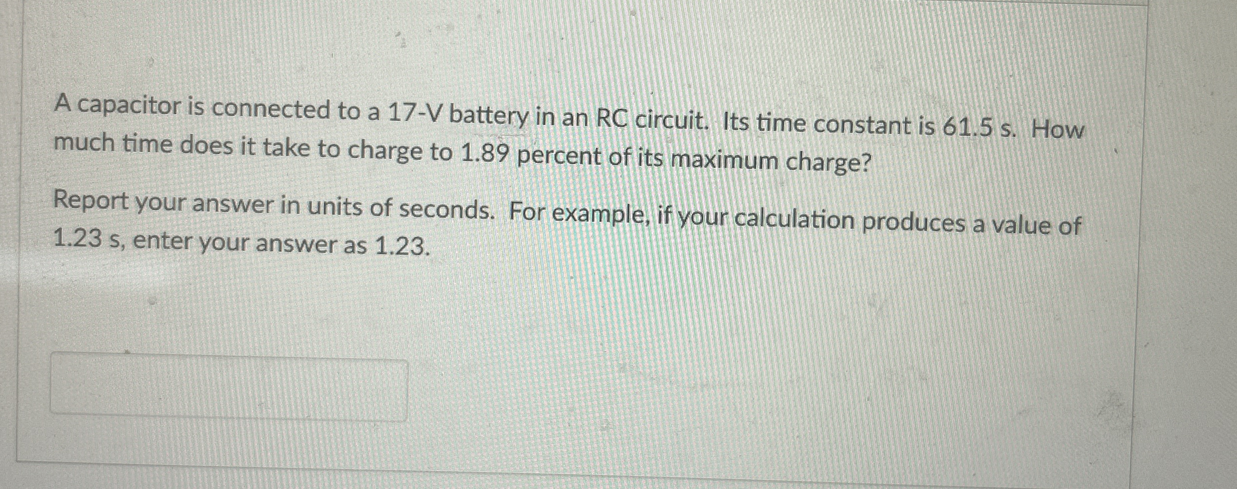 A capacitor is connected to a 1 7 - V battery in