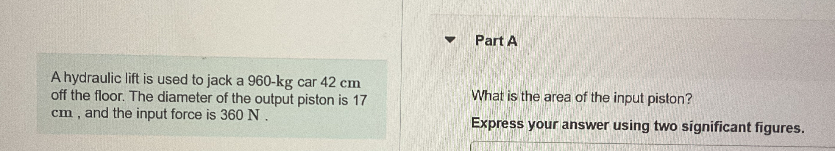 A hydraulic lift is used to jack a 9 6 0 - k g