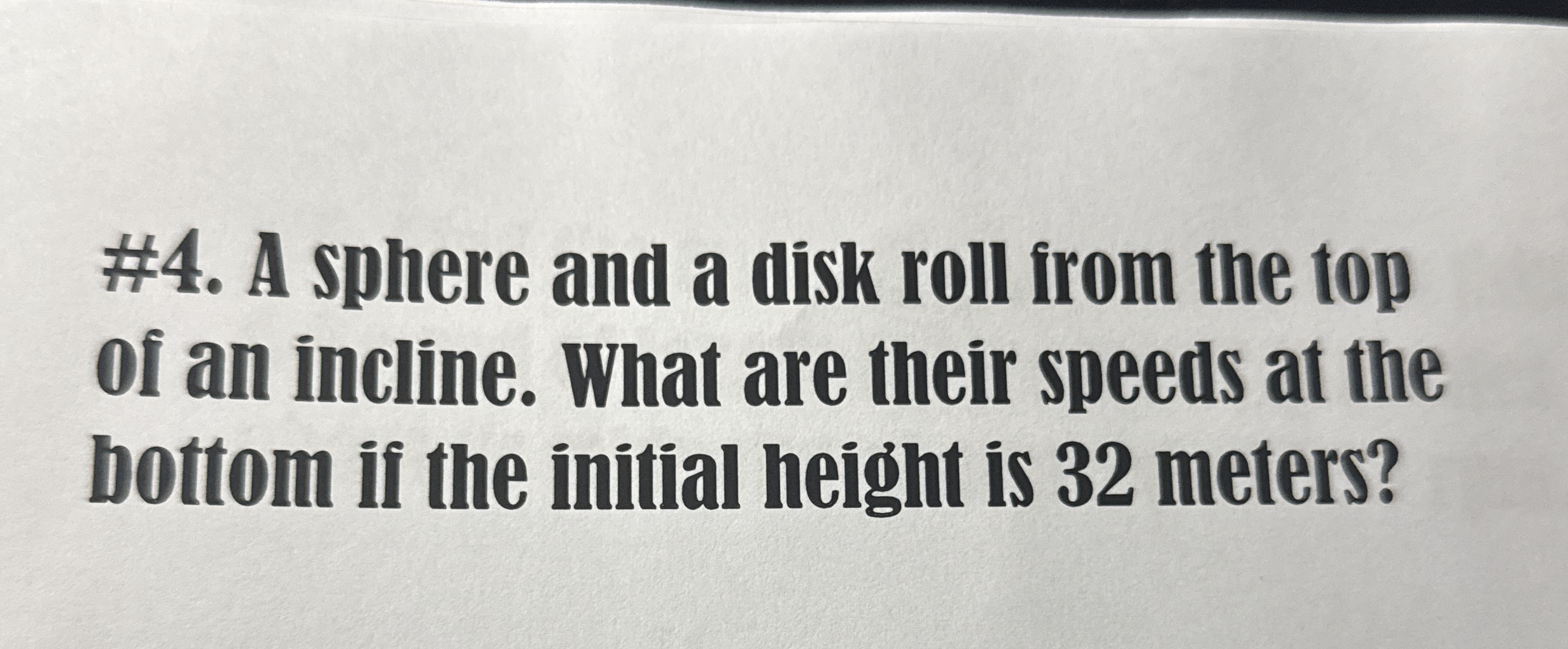 # 4 . A sphere and a disk roll from the top of an