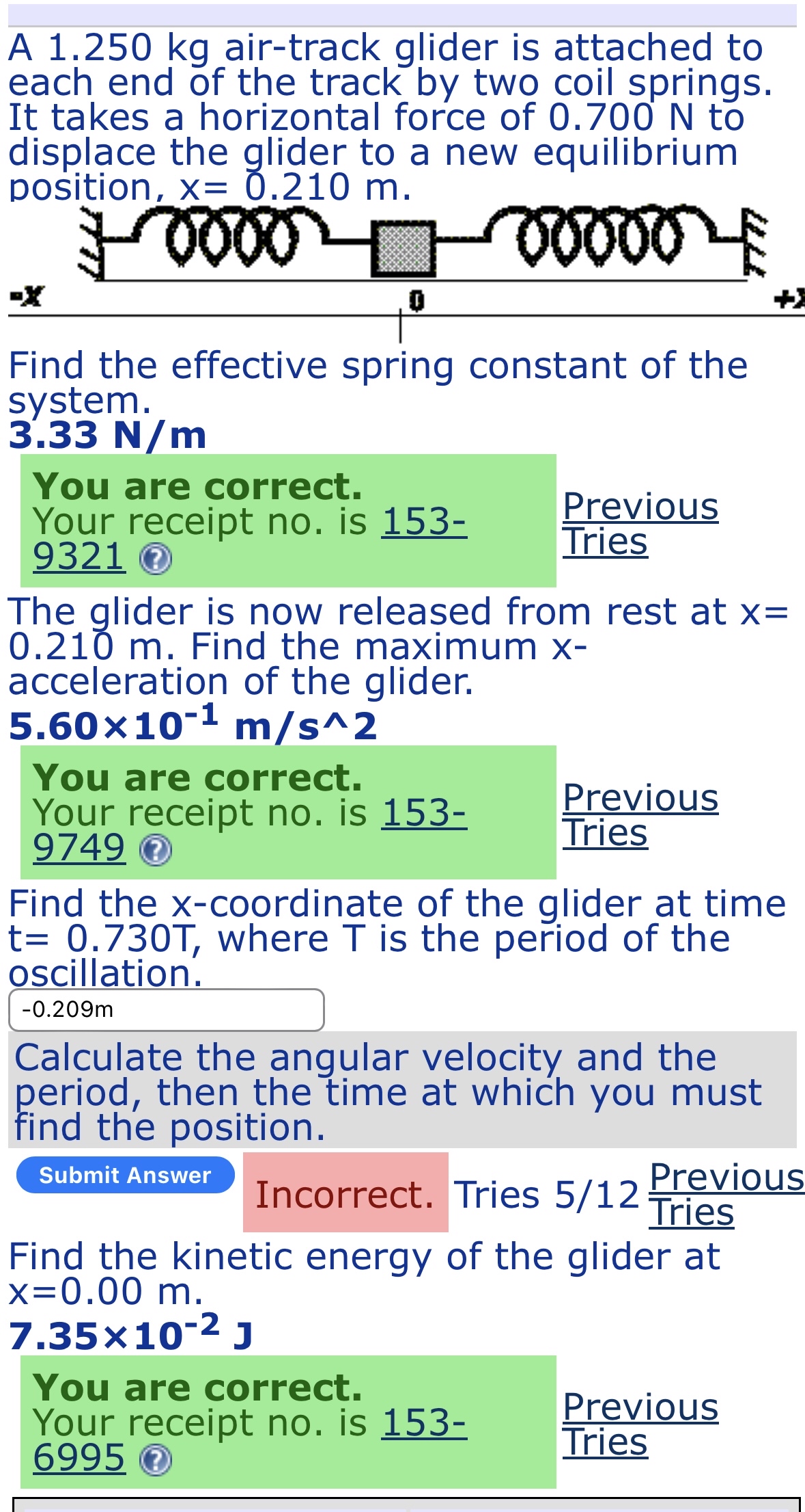 A 1 . 2 5 0 kg air - track glider is attached to