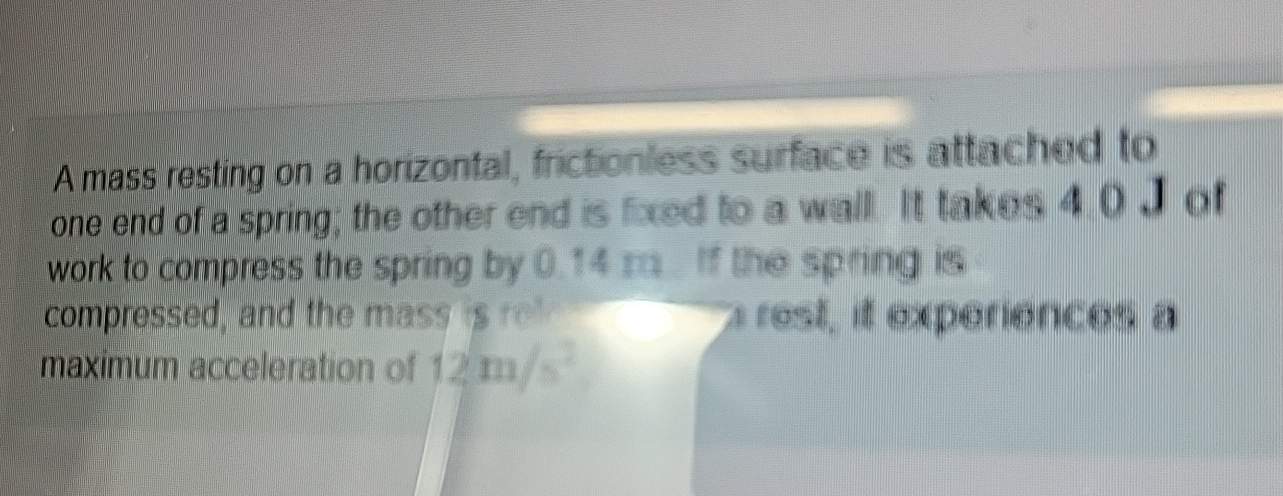 A mass resting on a horizontal, frictionless