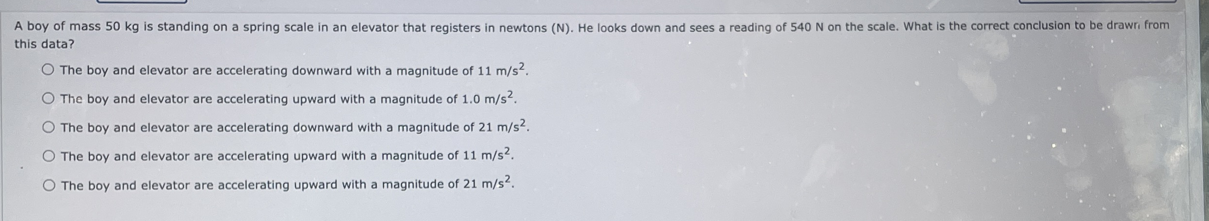A boy of mass 5 0 kg is standing on a spring