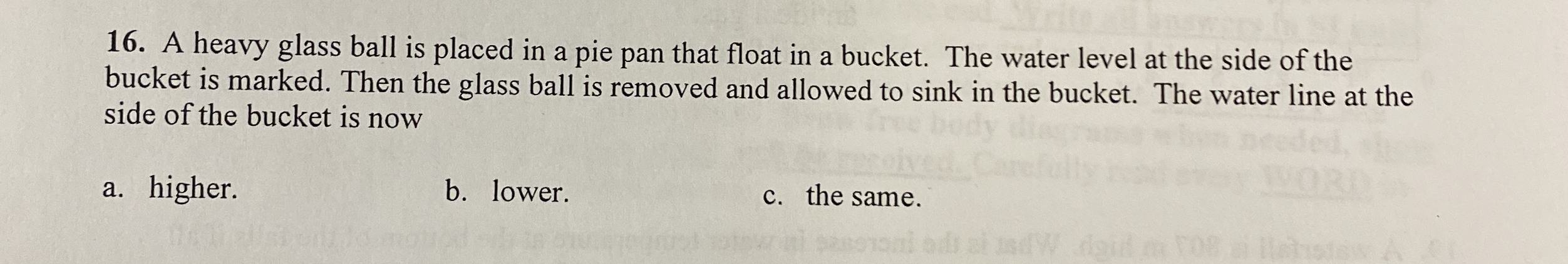 A heavy glass ball is placed in a pie pan that