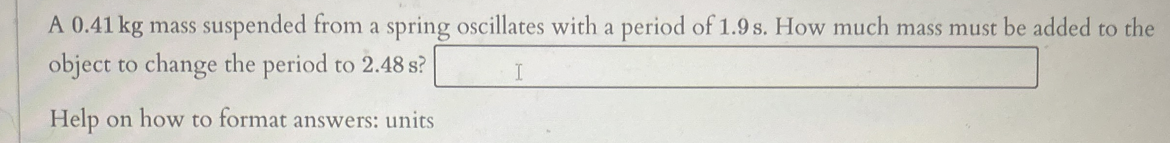 A 0 . 4 1 kg mass suspended from a spring