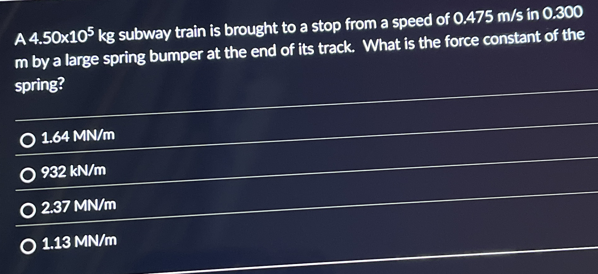 A 4 . 5 0 1 0 5 k g subway train is brought to a