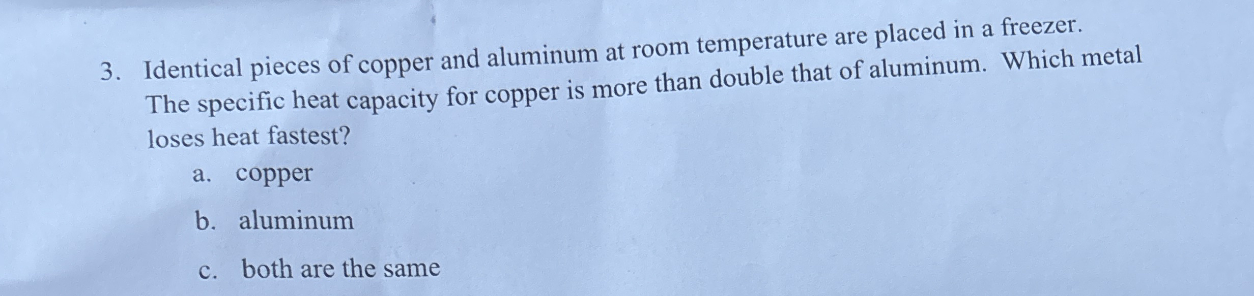 Identical pieces of copper and aluminum at room