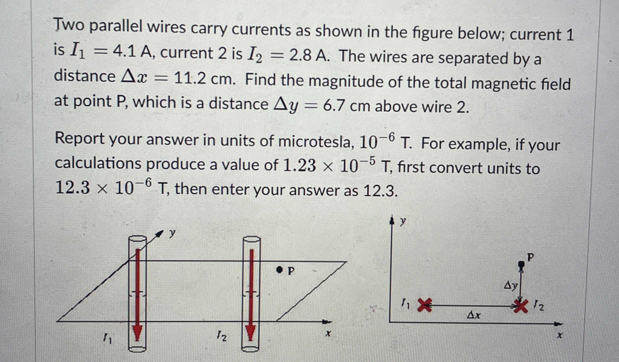 Two parallel wires carry currents as shown in the
