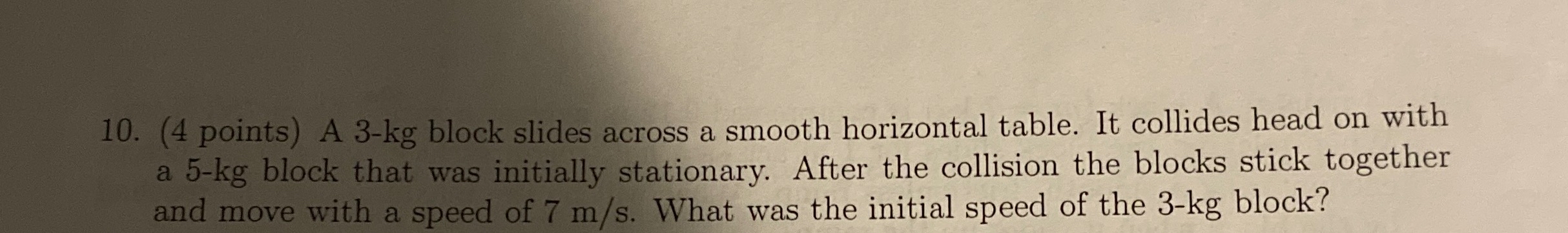 ( 4 points ) A 3 - kg block slides across a