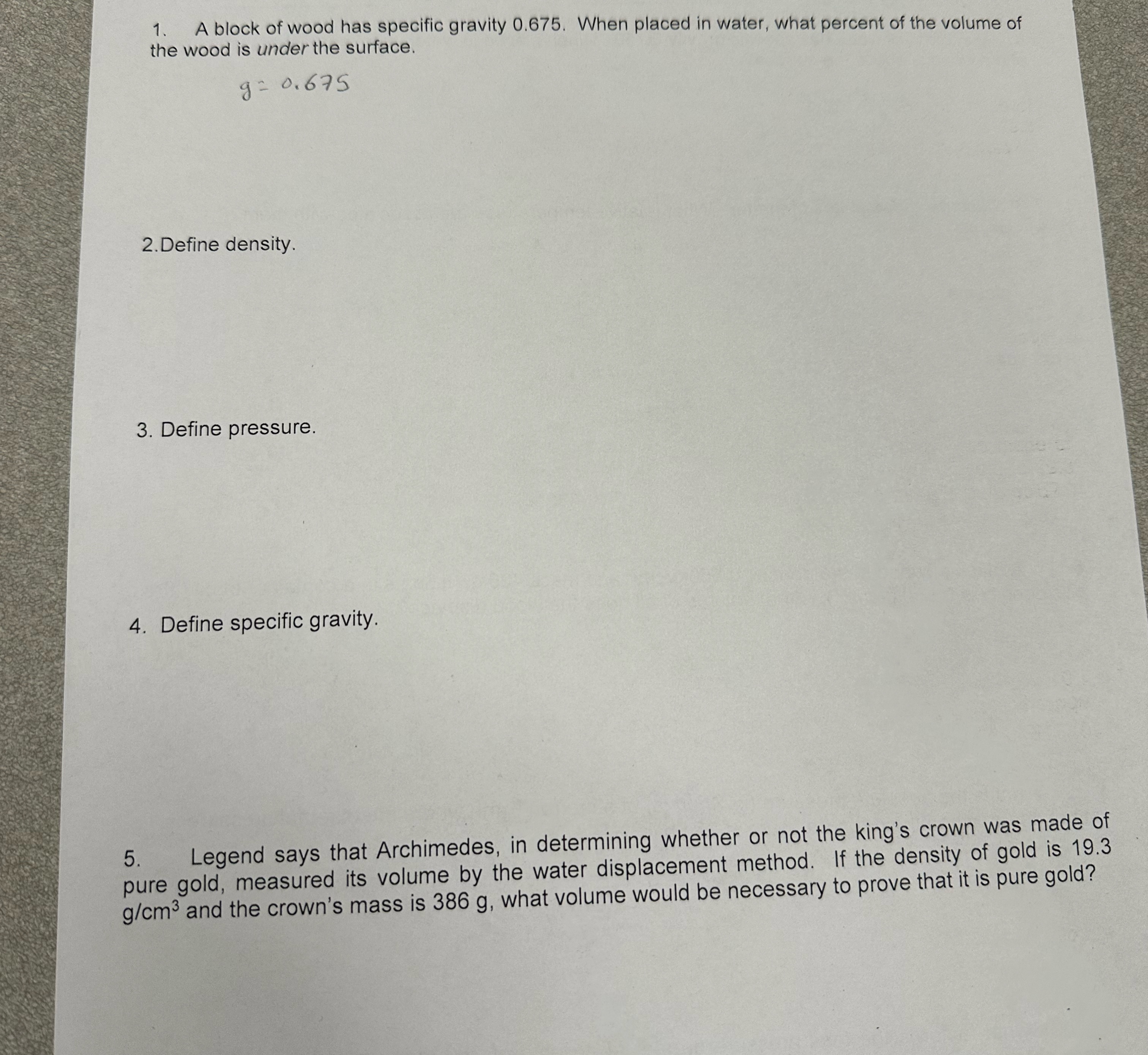 A block of wood has specific gravity 0 . 6 7 5 .