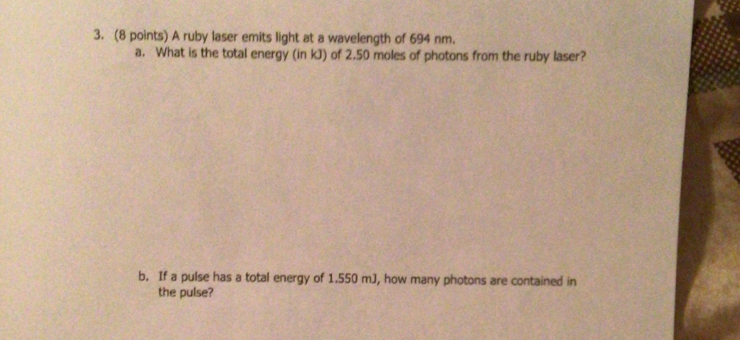 ( 8 points ) A ruby laser emits light at a
