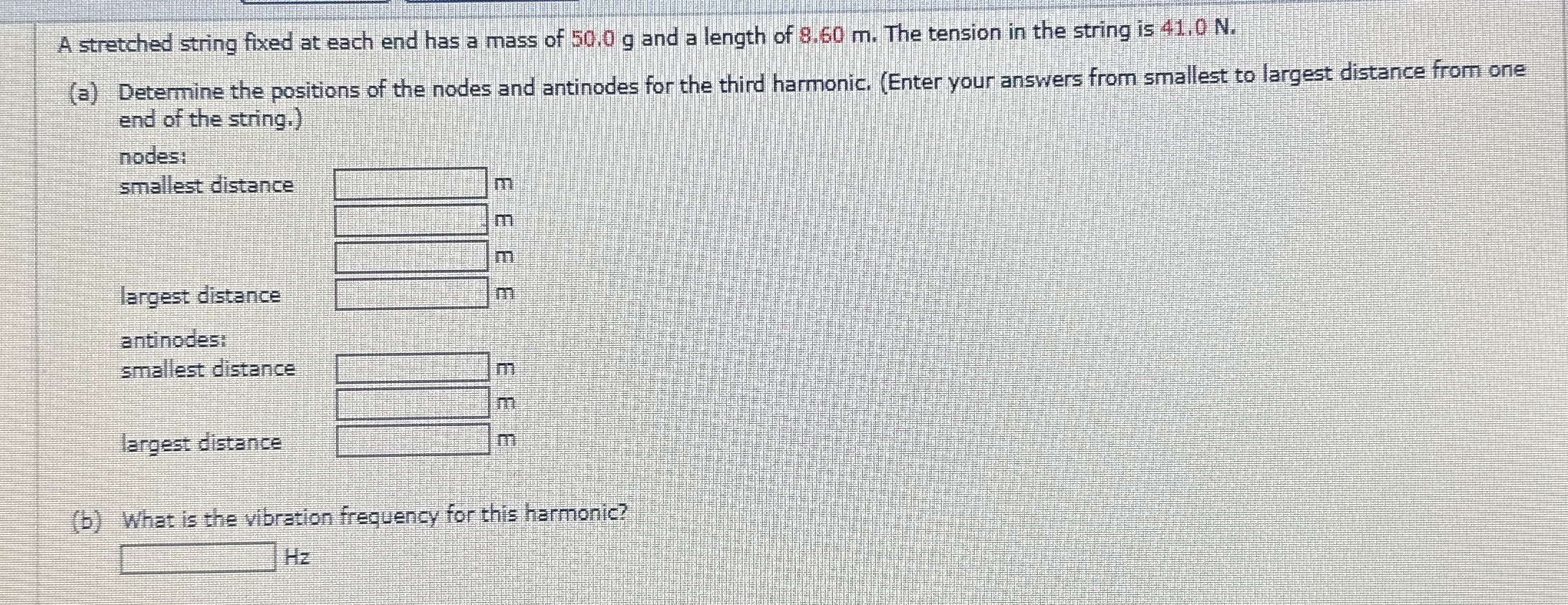 A stretched string fixed at each end has a mass