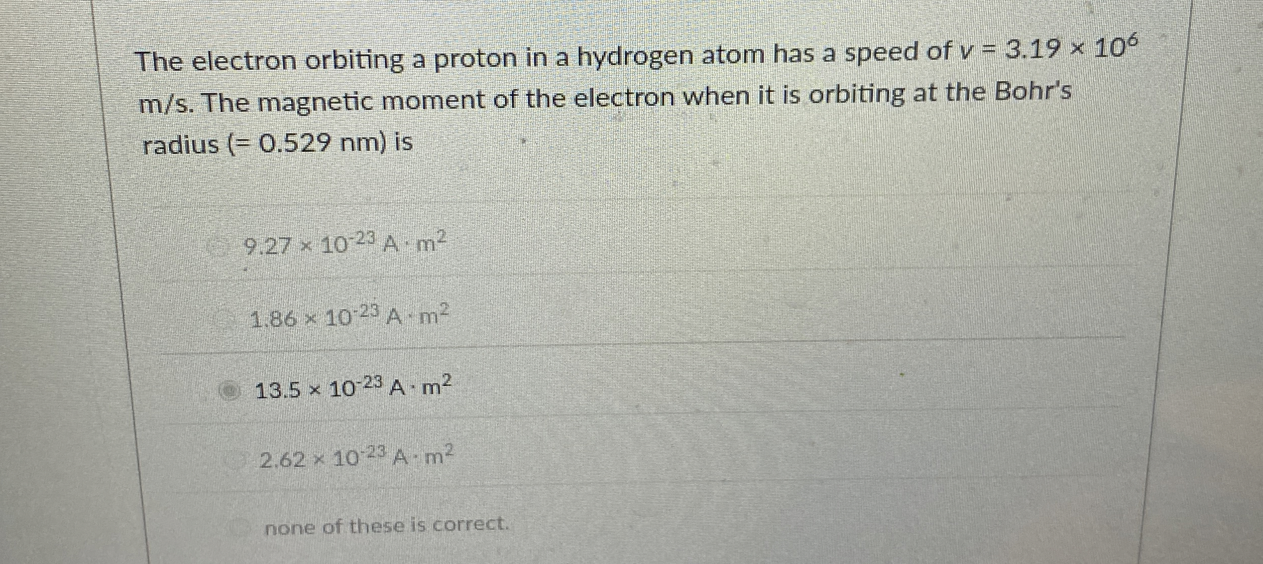 The electron orbiting a proton in a hydrogen atom