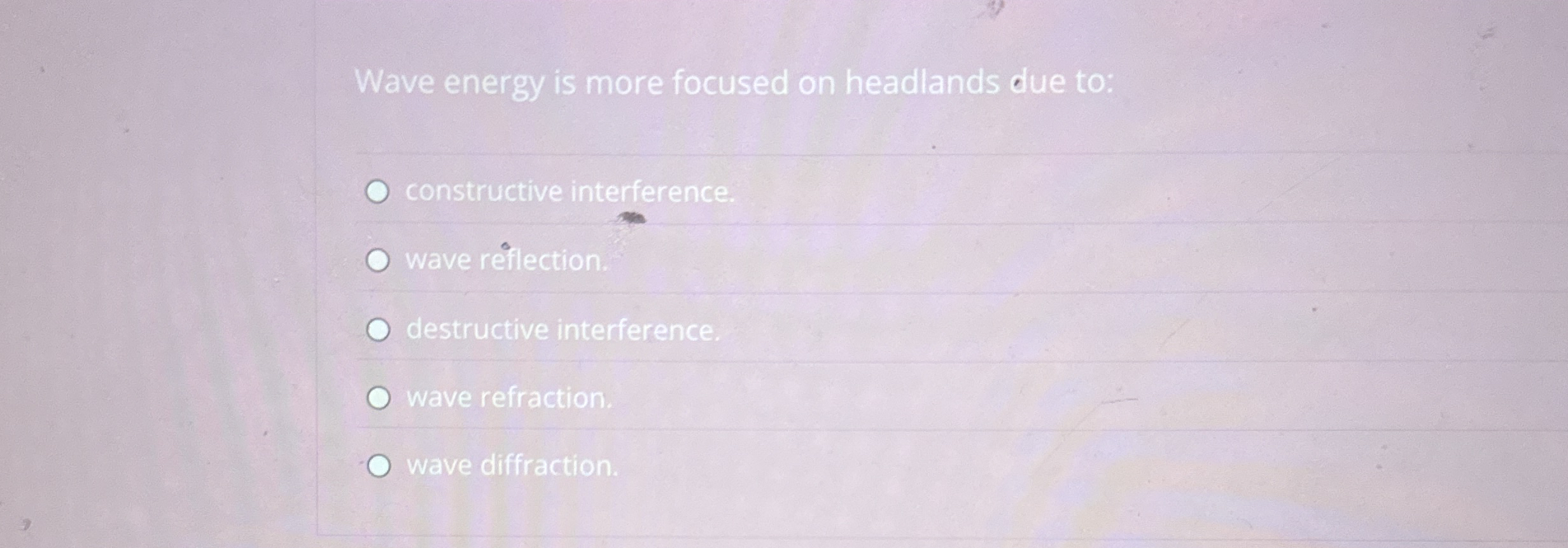 Wave energy is more focused on headlands due to: