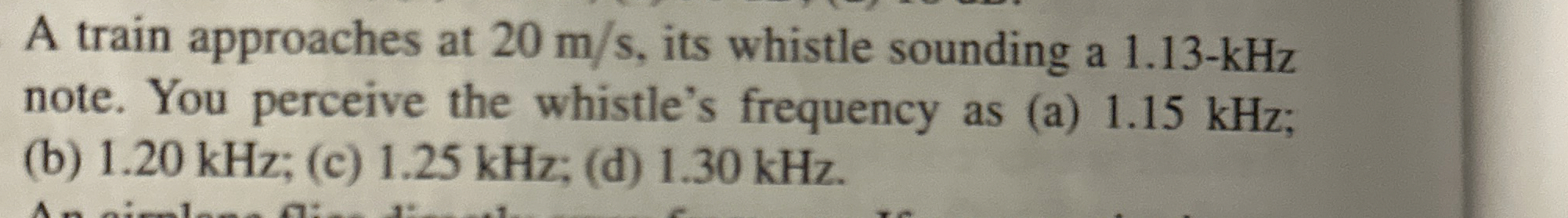 A train approaches at 2 0 m s , its whistle