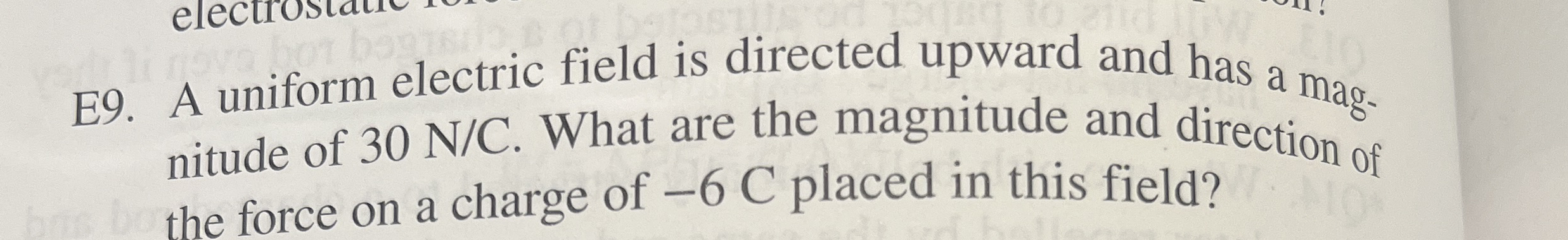 E 9 . A uniform electric field is directed upward