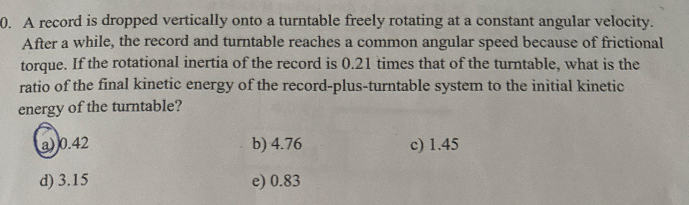 A record is dropped vertically onto a turntable