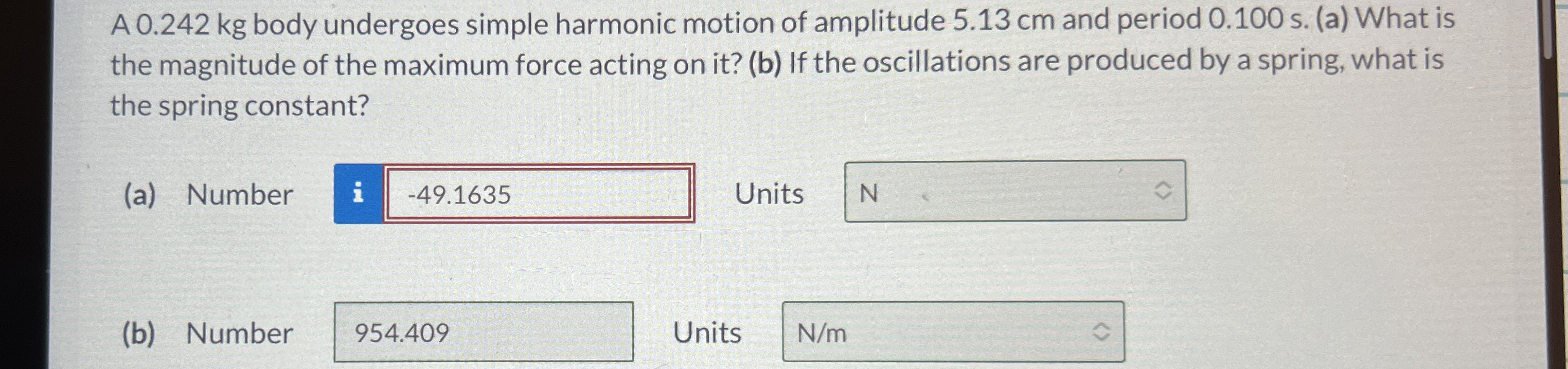 A 0 . 2 4 2 kg body undergoes simple harmonic