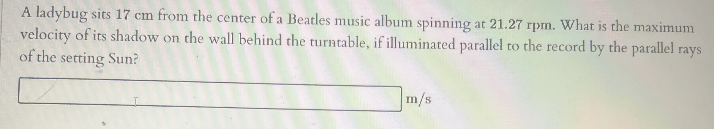 A ladybug sits 1 7 cm from the center of a