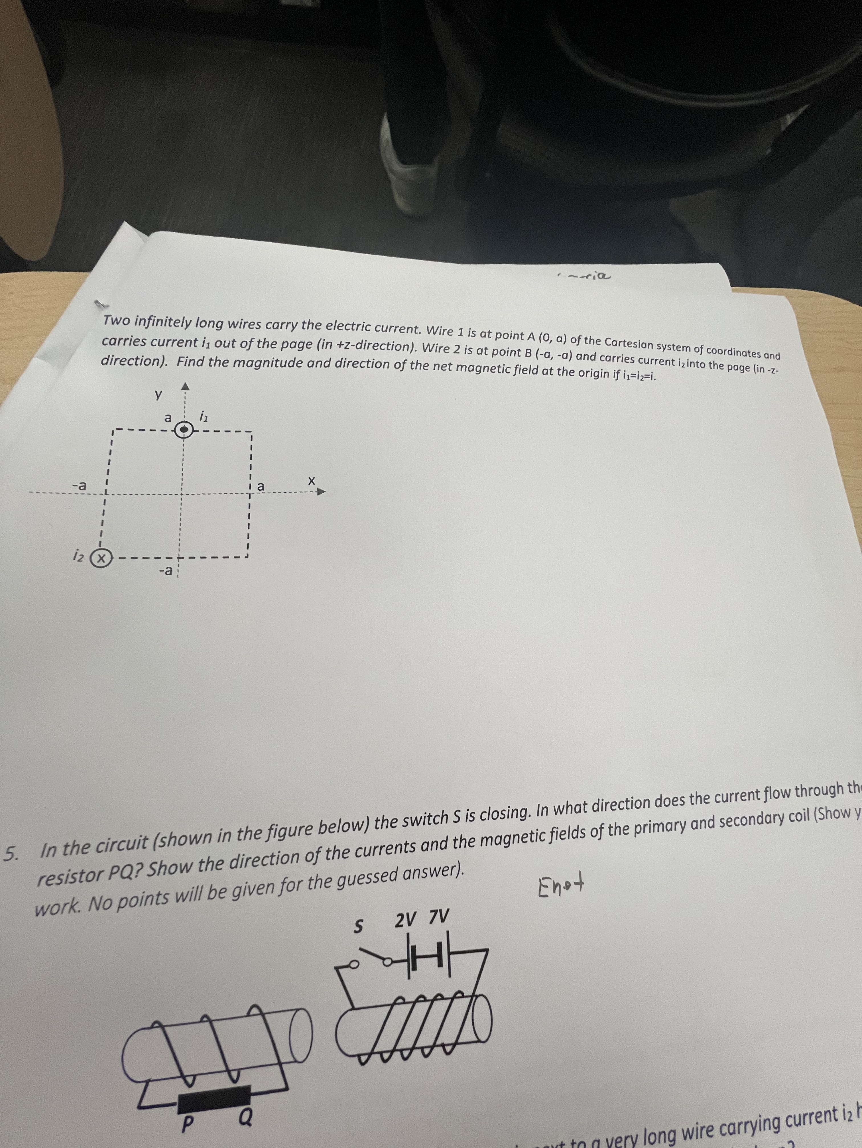 Two infinitely long wires carry the electric