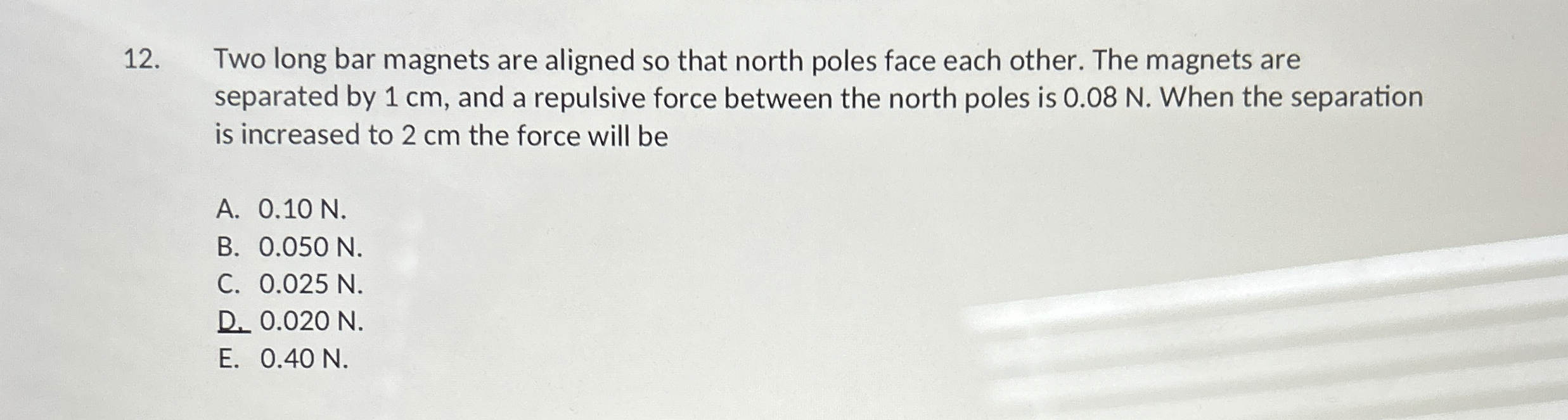 Two long bar magnets are aligned so that north