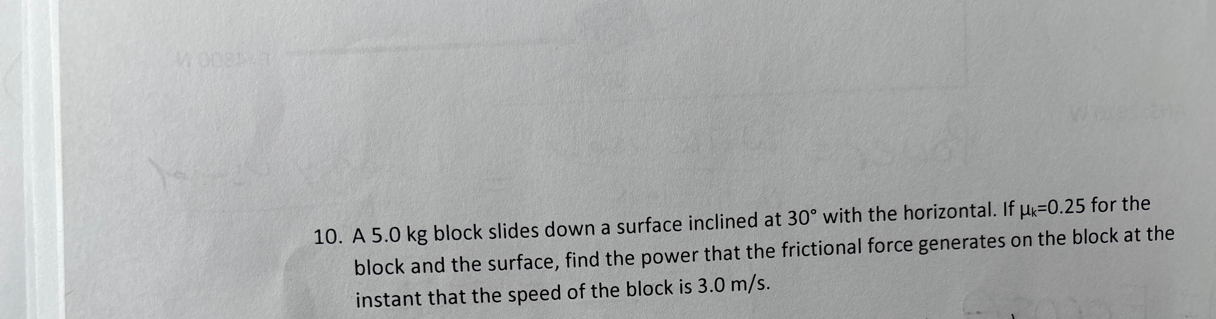 A 5 . 0 kg block slides down a surface inclined