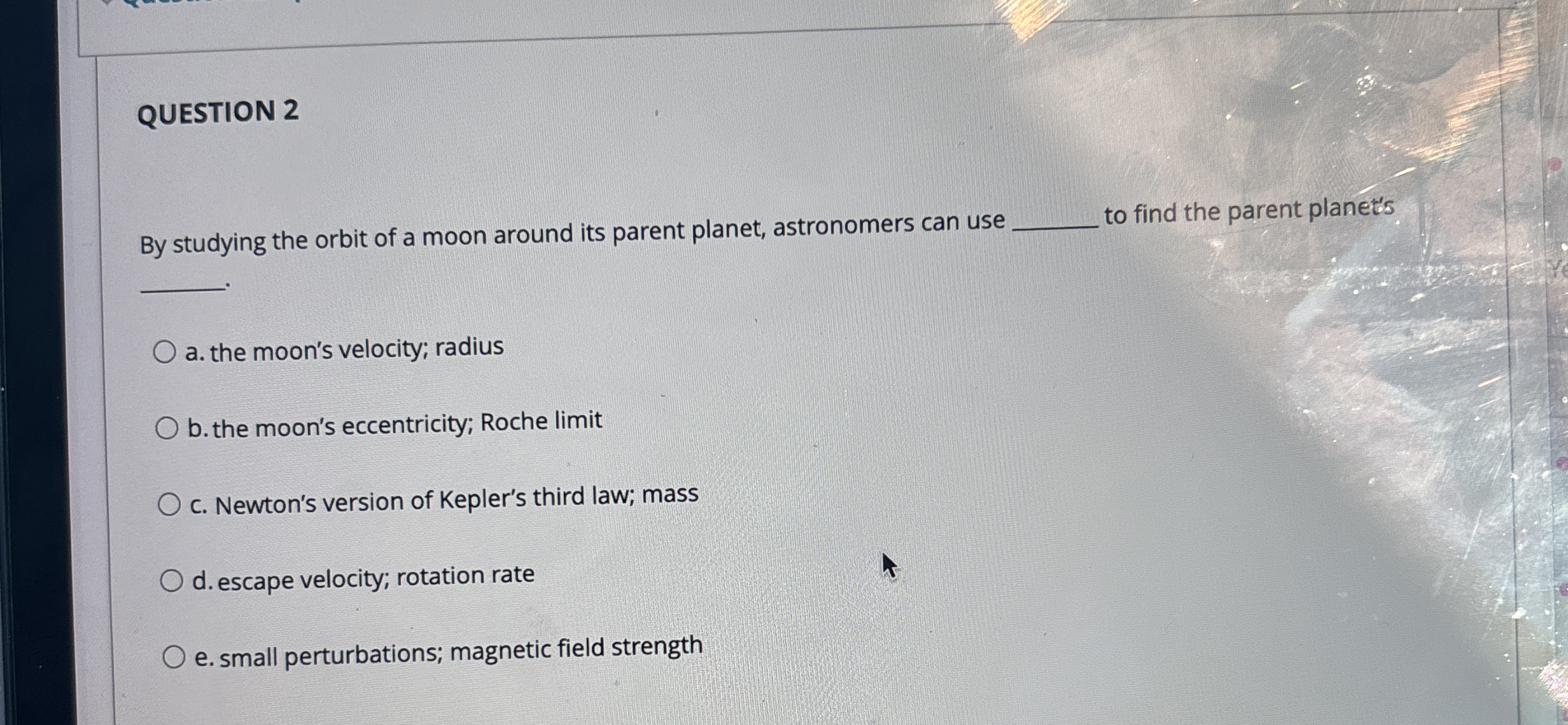 QUESTION 2 By studying the orbit of a moon around