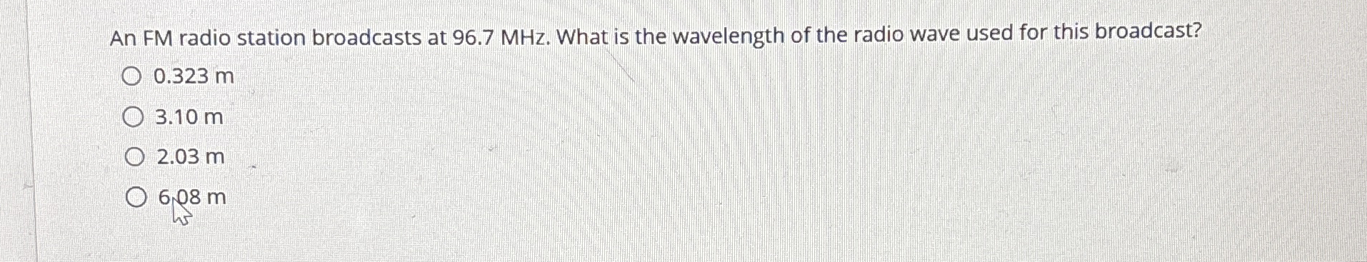 An FM radio station broadcasts at 9 6 . 7 MHz .