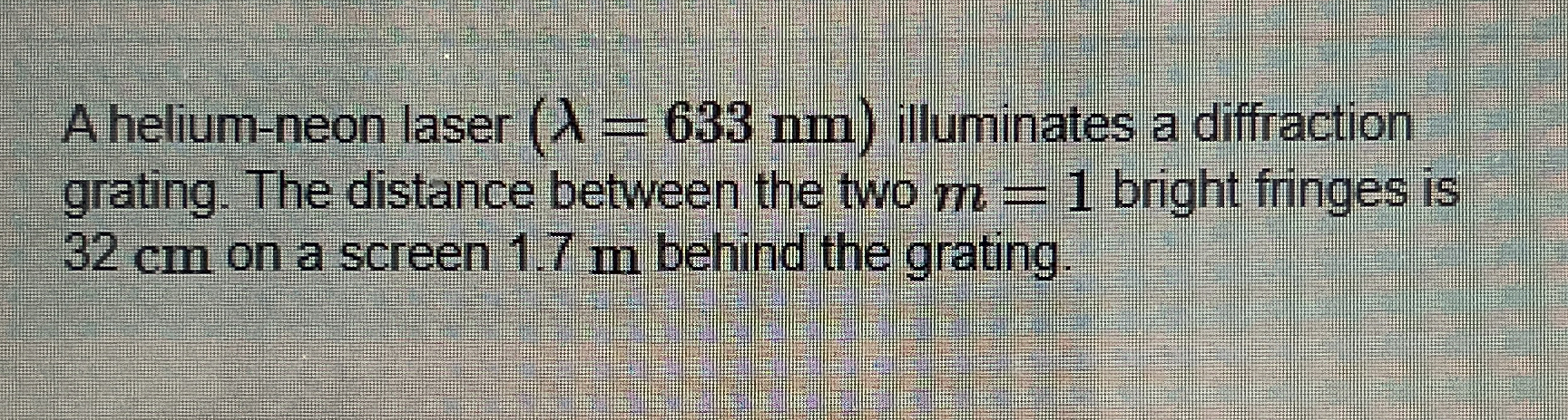 A helium - neon laser ) = ( 6 3 3 n m illuminates