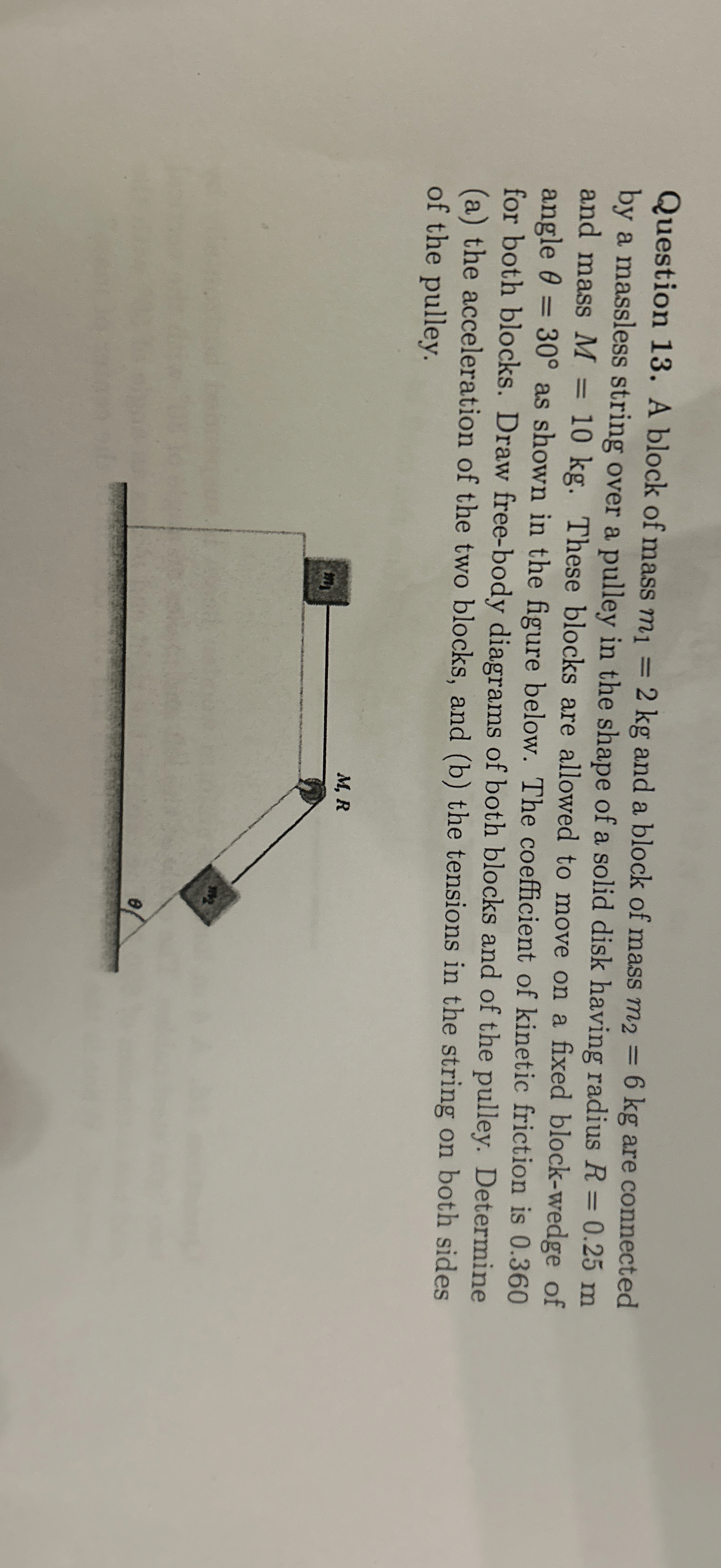 Question 1 3 . A block of mass m 1 = 2 k g and a