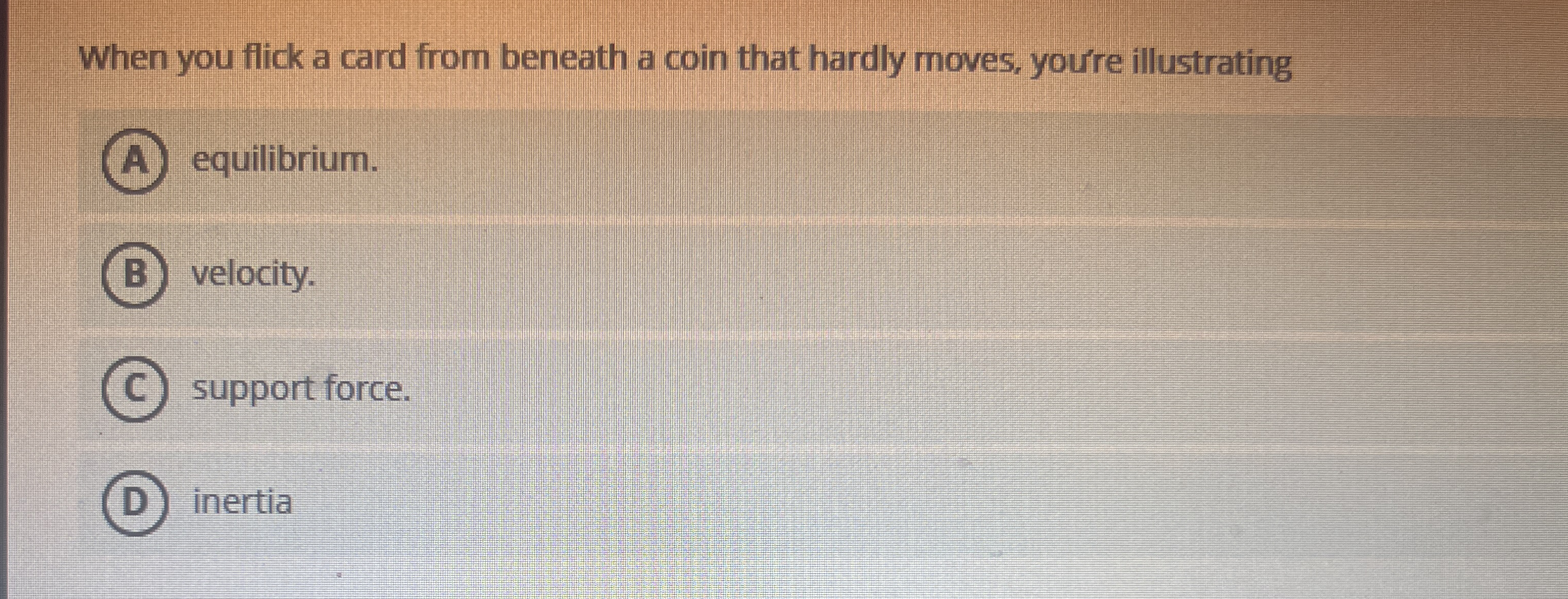 When you flick a card from beneath a coin that