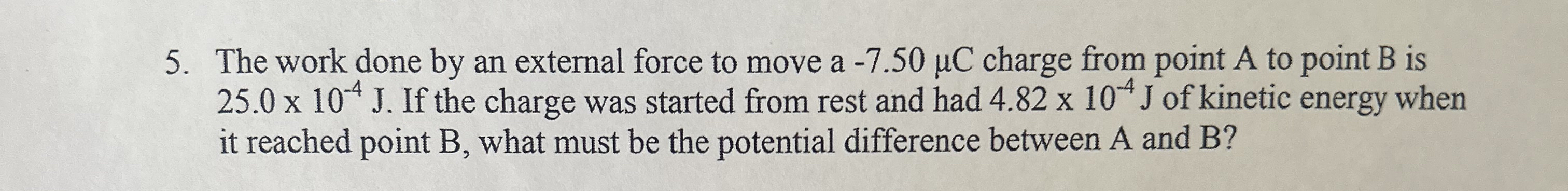 The work done by an external force to move a - 7