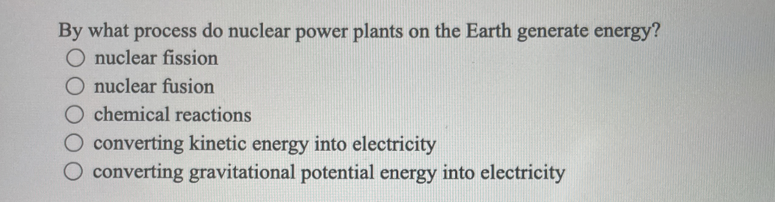 By what process do nuclear power plants on the