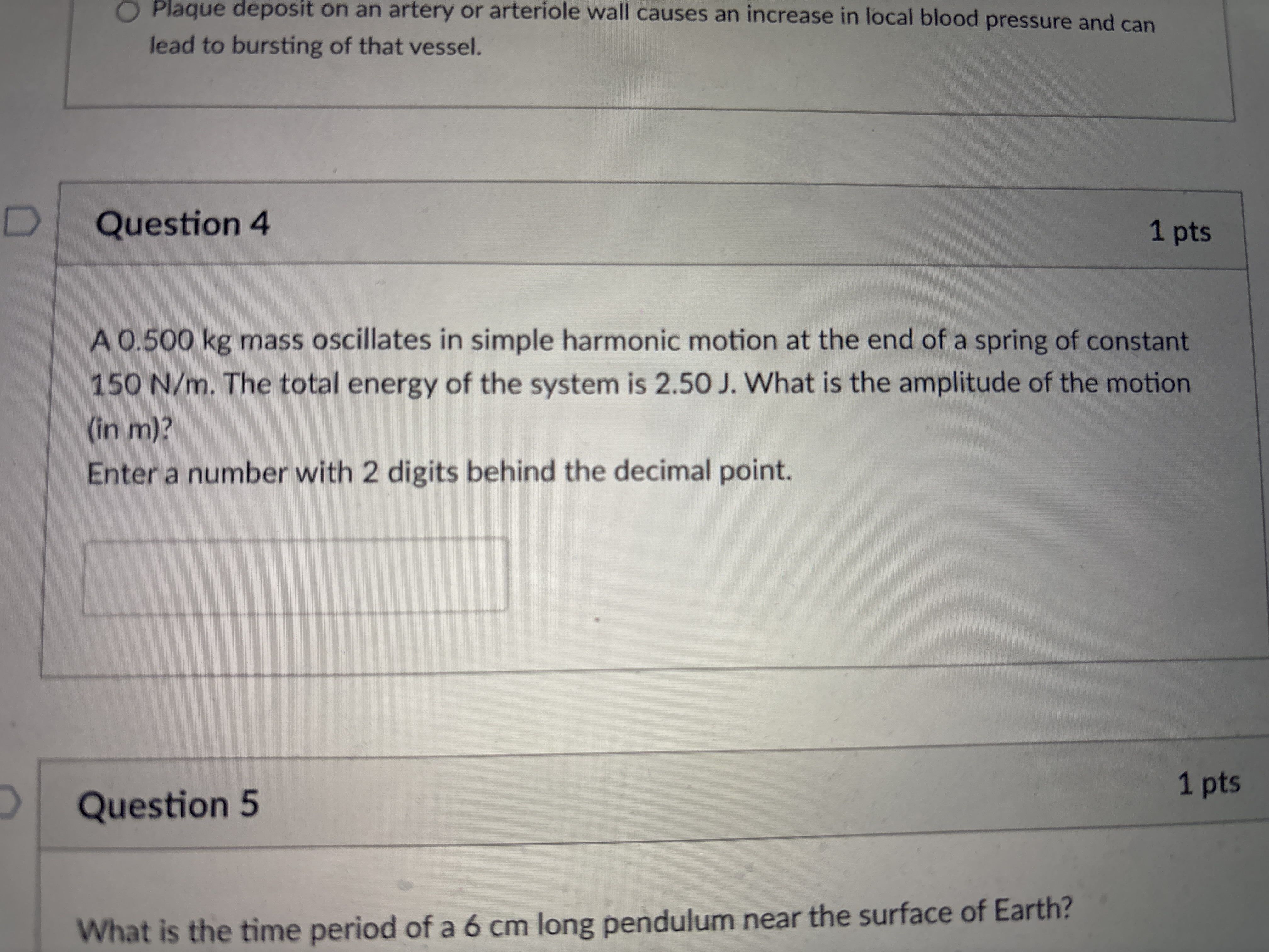 Question 4 A 0 . 5 0 0 kg mass oscillates in