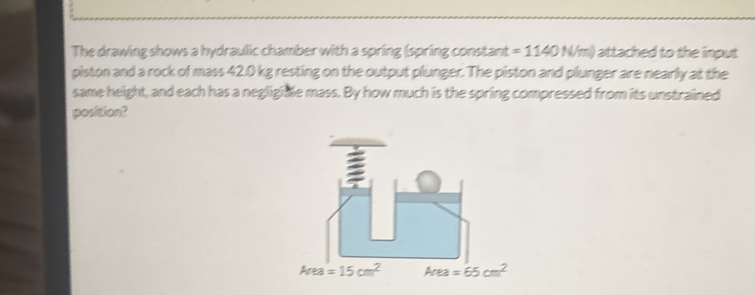 The drawing shows a hydraulic chamber with a