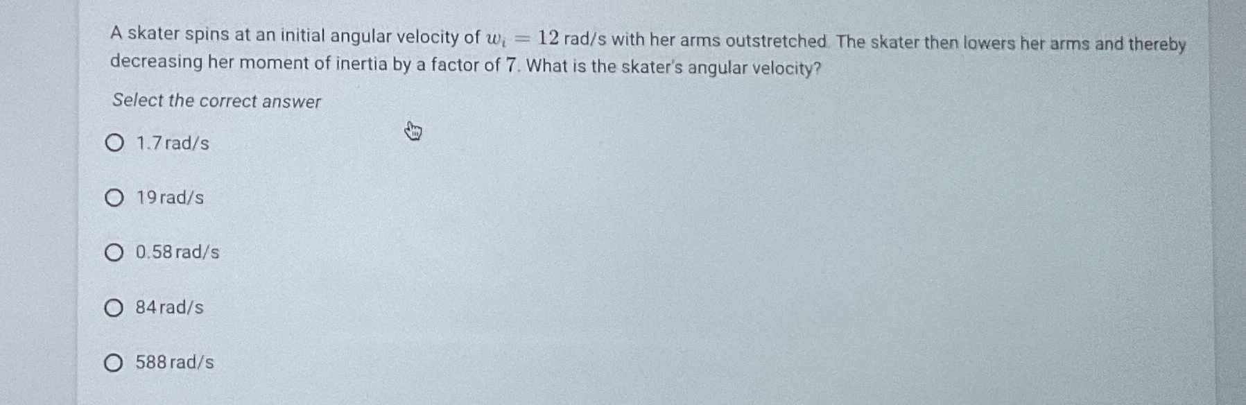 A skater spins at an initial angular velocity of