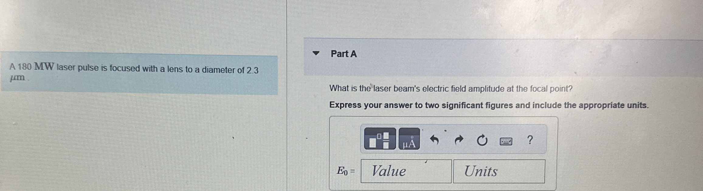 A 1 8 0 MW laser pulse is focused with a lens to