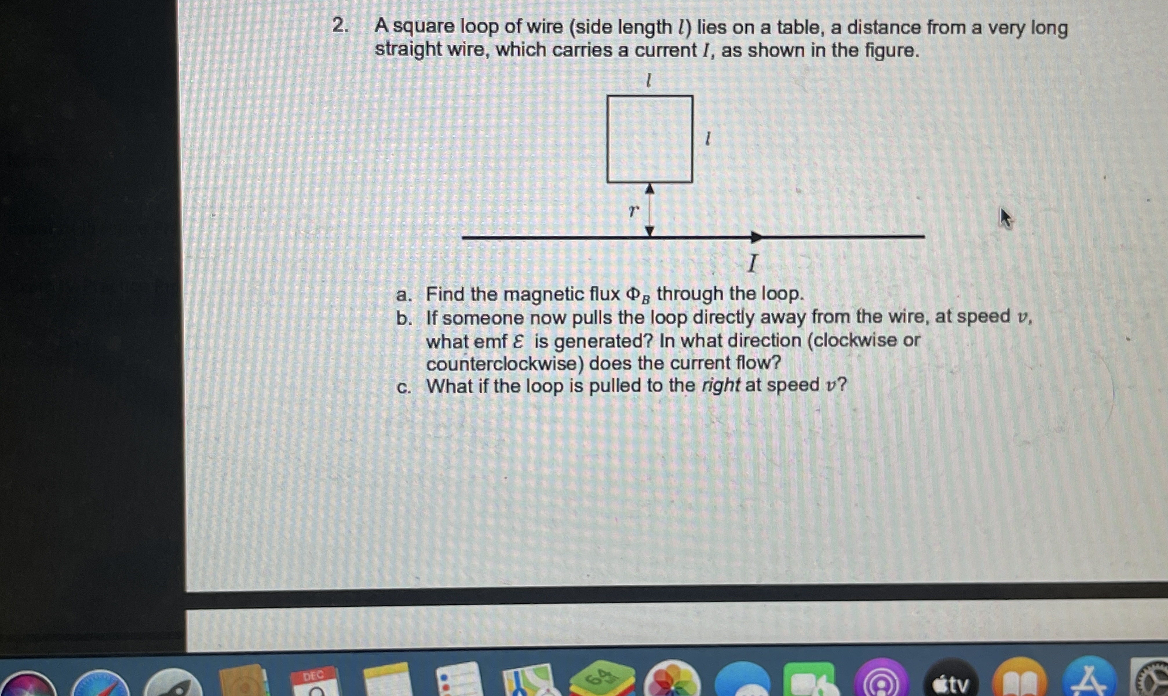 A square loop of wire ( side length l ) lies on a