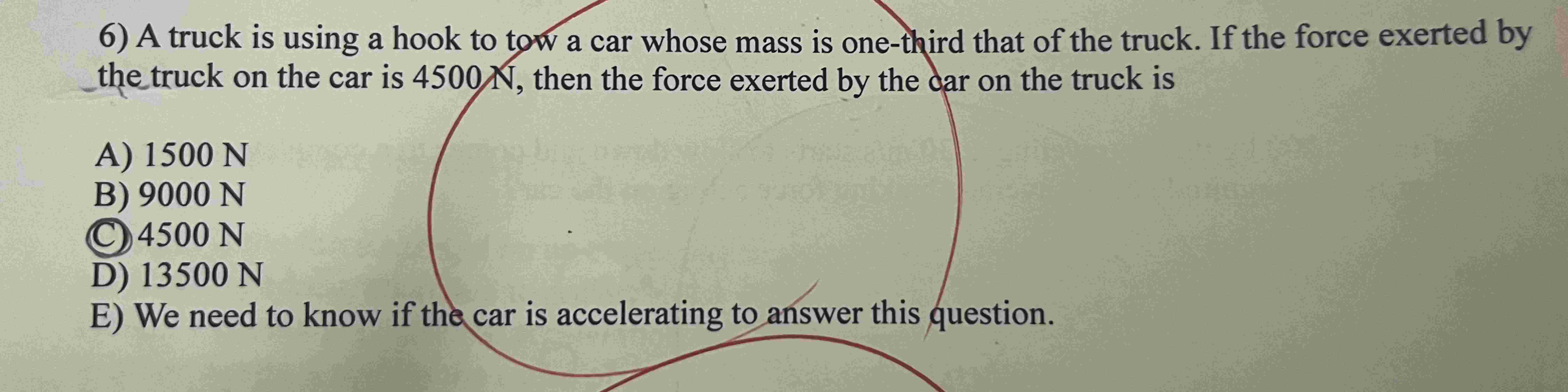 6 ) A truck is using a hook to tow a car whose